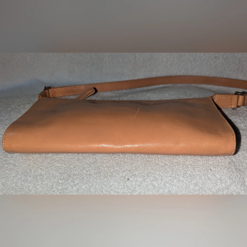 Monsac tan leather bag.